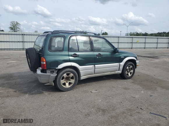 1999 Suzuki Grand Vitara LX with VIN JS3TD62V0X4124366, listed as a Copart auction lot 50885055 with 204,168 mi miles and Salvage Title. Bid and sale history available at carsss.com. Image 3.