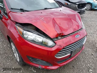 2016 Ford Fiesta SE with VIN 3FADP4EJ3GM198611, listed as a IAAI auction lot 41819332 with 122,700 mi miles. Bid and sale history available at carsss.com. Image 6.