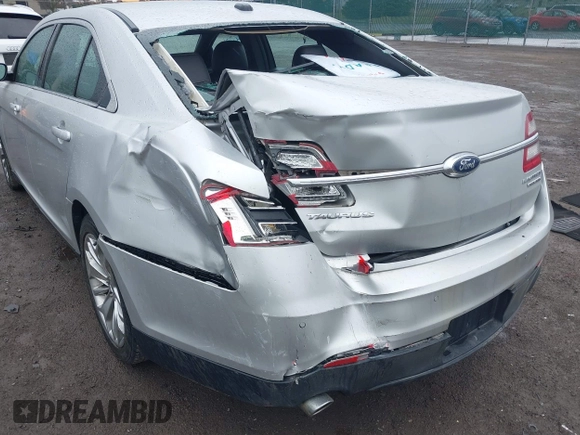 2014 Ford Taurus Limited with VIN 1FAHP2F81EG123933, listed as a IAAI auction lot 41843301 with 111,629 mi miles. Bid and sale history available at carsss.com. Image 6.