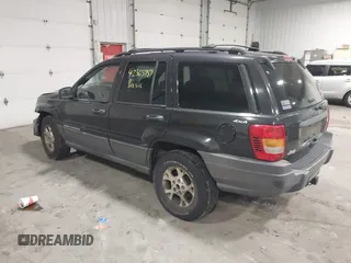 1999 Jeep Grand Cherokee Laredo with VIN 1J4GW58SXXC649579, listed as a IAAI auction lot 42365959 with 199,742 mi miles and . Bid and sale history available at DreamBid. Image 3.