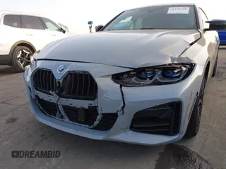 2023 BMW 4 Series M440i with VIN WBA63AW02PFN40551, listed as a IAAI auction lot 41230910 with 23,526 mi miles and . Bid and sale history available at DreamBid. Image 6.