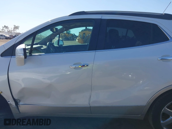 2016 Buick Encore Leather with VIN KL4CJCSB2GB544440, listed as a IAAI auction lot 37711234 with 61,927 mi miles. Bid and sale history available at carsss.com. Image 15.