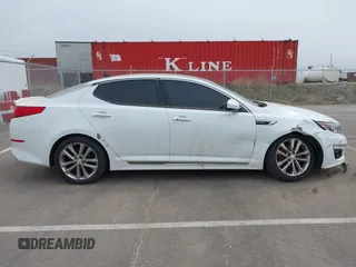 2015 Kia Optima SX Turbo with VIN 5XXGR4A69FG361006, listed as a IAAI auction lot 41870382 with 150,084 mi miles. Bid and sale history available at carsss.com. Image 13.