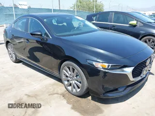 2024 Mazda 3 S Preferred z VIN 3MZBPACM3RM417418, wystawiony jako IAAI lot #42358414 z przebiegiem 31 801 mil mil oraz . Historia ofert i sprzedaży dostępna na DreamBid. Obrazek 1.