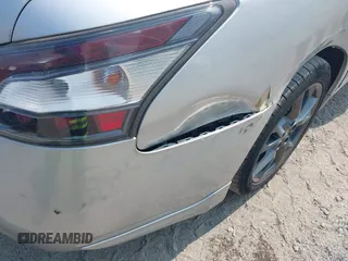 2012 Nissan Maxima SV z VIN 1N4AA5AP6CC841081, wystawiony jako IAAI lot #42428824 z przebiegiem 131 026 mil mil oraz . Historia ofert i sprzedaży dostępna na DreamBid. Obrazek 14.