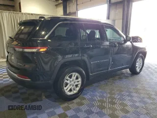 2023 Jeep Grand Cherokee Laredo with VIN 1C4RJHAG7P8866871, listed as a Copart auction lot 58341235 with 48,737 mi miles and Salvage title. Bid and sale history available at DreamBid. Image 3.