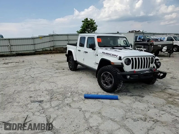 2021 Jeep Gladiator Rubicon z VIN 1C6JJTBG0ML624275, wystawiony jako Copart lot #62840275 z przebiegiem Nie podano mil oraz Szkoda całkowita • Salvage title. Historia ofert i sprzedaży dostępna na DreamBid. Obrazek 14.
