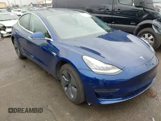2020 Tesla Model 3 Standard Range Plus with VIN 5YJ3E1EAXLF644679, listed as a IAAI auction lot 41500595 with 53,726 mi miles and . Bid and sale history available at DreamBid. Image 1.