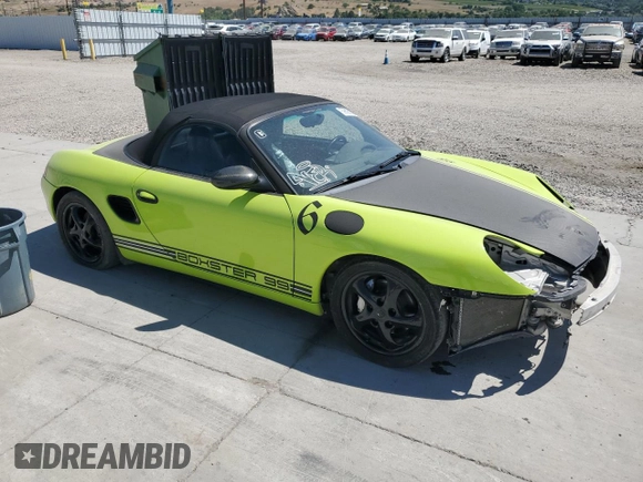 1999 Porsche Boxster with VIN WP0CA2987XU622760, listed as a Copart auction lot 59898355 with 104,425 mi miles and Salvage title. Bid and sale history available at DreamBid. Image 4.