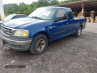 2002 Ford F-150 XL with VIN 1FTRX17W12NC06310, listed as a IAAI auction lot 42160213 with Not provided miles and . Bid and sale history available at DreamBid. Image 2.