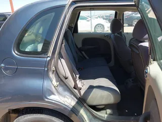2003 Chrysler PT Cruiser with VIN 3C4FY48B13T526533, listed as a IAAI auction lot 42002527 with 115,364 mi miles. Bid and sale history available at carsss.com. Image 8.