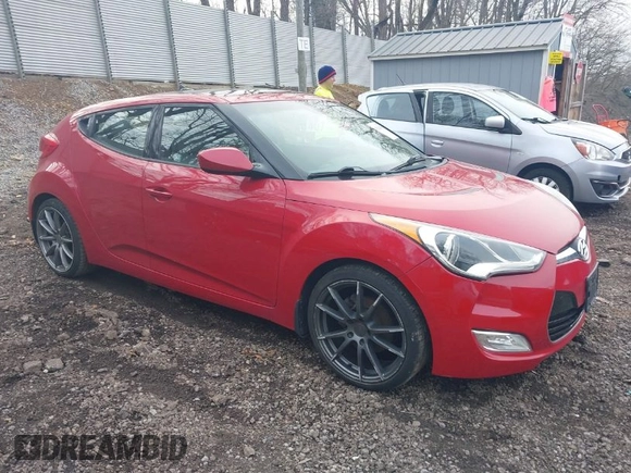 2012 Hyundai Veloster w/Black Int z VIN KMHTC6AD4CU072868, wystawiony jako IAAI lot #42029030 z przebiegiem 112 817 mil mil oraz . Historia ofert i sprzedaży dostępna na DreamBid. Obrazek 1.