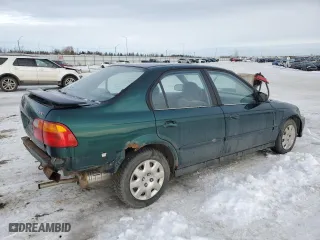 1999 Honda Civic VP with VIN 2HGEJ6619XH906970, listed as a Copart auction lot 88258005 with 297,124 mi miles and Clean Title. Bid and sale history available at carsss.com. Image 3.