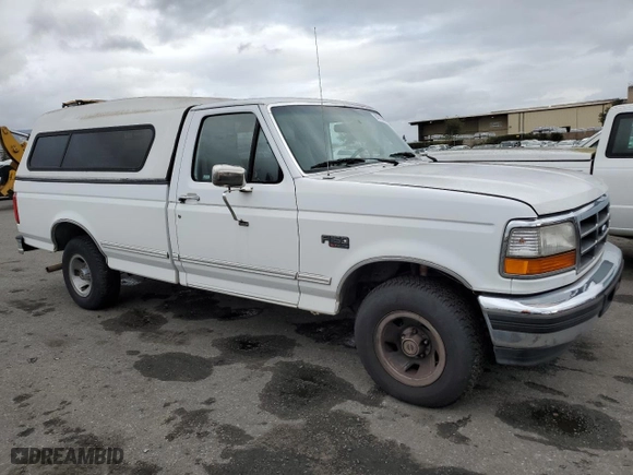 1996 Ford F-150 Special with VIN 1FTEF15NXTLA33511, listed as a Copart auction lot 84913654 with 143,262 mi miles and Clean Title. Bid and sale history available at carsss.com. Image 4.