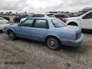 1993 Oldsmobile Cutlass Ciera S z VIN 1G3AG55N9P6451968, wystawiony jako Copart lot #72746634 z przebiegiem 88 151 mil mil oraz Szkody całkowita. Historia ofert i sprzedaży dostępna na DreamBid. Obrazek 2.