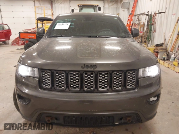 2018 Jeep Grand Cherokee Laredo E with VIN 1C4RJFAG6JC499261, listed as a IAAI auction lot 41033418 with 67,554 mi miles and . Bid and sale history available at DreamBid. Image 12.