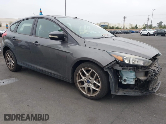 2015 Ford Focus SE with VIN 1FADP3K27FL387012, listed as a IAAI auction lot 42100945 with 85,588 mi miles. Bid and sale history available at carsss.com. Image 1.