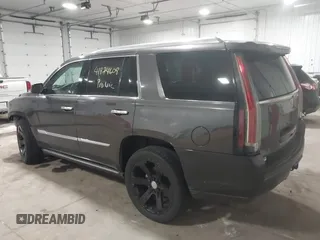 2015 Cadillac Escalade Premium z VIN 1GYS4CKJ8FR308617, wystawiony jako IAAI lot #41974608 z przebiegiem 154 014 mil mil oraz . Historia ofert i sprzedaży dostępna na DreamBid. Obrazek 3.