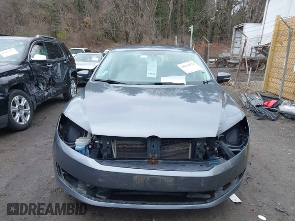 2015 Volkswagen Passat Wolfsburg Edition with VIN 1VWAT7A37FC026077, listed as a IAAI auction lot 41630524 with 136,966 mi miles and . Bid and sale history available at DreamBid. Image 12.