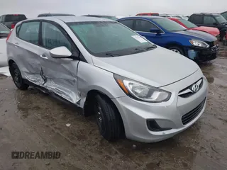 2013 Hyundai Accent GS z VIN KMHCT5AEXDU126601, wystawiony jako IAAI lot #41571619 z przebiegiem 98 086 mil mil oraz . Historia ofert i sprzedaży dostępna na DreamBid. Obrazek 1.