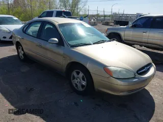 2001 Ford Taurus SEL Deluxe with VIN 1FAHP56S41G269850, listed as a IAAI auction lot 42020407 with 144,436 mi miles. Bid and sale history available at carsss.com. Image 1.
