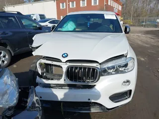 2019 BMW X6 xDrive35i with VIN 5UXKU2C57K0Z63351, listed as a IAAI auction lot 41637597 with 91,121 mi miles. Bid and sale history available at carsss.com. Image 12.