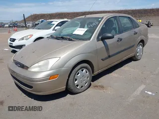 2000 Ford Focus LX with VIN 1FAFP33P2YW427999, listed as a IAAI auction lot 42874144 with 121,885 mi miles and . Bid and sale history available at DreamBid. Image 2.