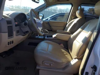 2011 Nissan Titan SL with VIN 1N6AA0EC7BN323825, listed as a Copart auction lot 46978315 with 143,228 mi miles and Salvage Title. Bid and sale history available at carsss.com. Image 7.