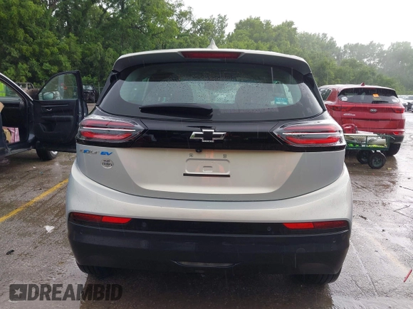 2023 Chevrolet Bolt EV 1LT with VIN 1G1FW6S03P4140824, listed as a IAAI auction lot 42383006 with 23,942 mi miles and . Bid and sale history available at DreamBid. Image 16.