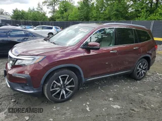 2019 Honda Pilot Elite with VIN 5FNYF6H05KB014358, listed as a Copart auction lot 56230555 with 32,660 mi miles and Salvage title. Bid and sale history available at DreamBid. Image 1.