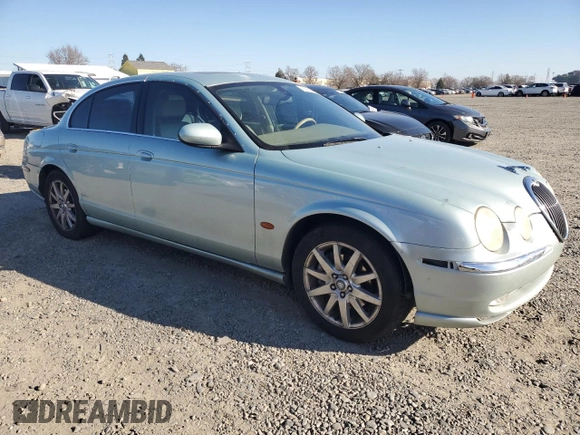 2003 Jaguar S-Type with VIN SAJEA01T93FM46260, listed as a Copart auction lot 87573835 with 129,563 mi miles and Clean Title. Bid and sale history available at DreamBid. Image 4.