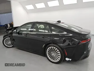 2021 Toyota Mirai XLE with VIN JTDAAAAA1MA002130, listed as a Copart auction lot 52319235 with 34,438 mi miles and Salvage title. Bid and sale history available at DreamBid. Image 2.