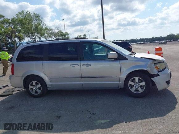 2010 Dodge Grand Caravan SXT with VIN 2D4RN5D15AR196651, listed as a IAAI auction lot 42105957 with 244,374 mi miles and . Bid and sale history available at DreamBid. Image 13.