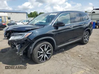 2022 Honda Pilot Touring 7-Passenger with VIN 5FNYF6H62NB057161, listed as a Copart auction lot 64944655 with 21,694 mi miles and Salvage title. Bid and sale history available at DreamBid. Image 1.