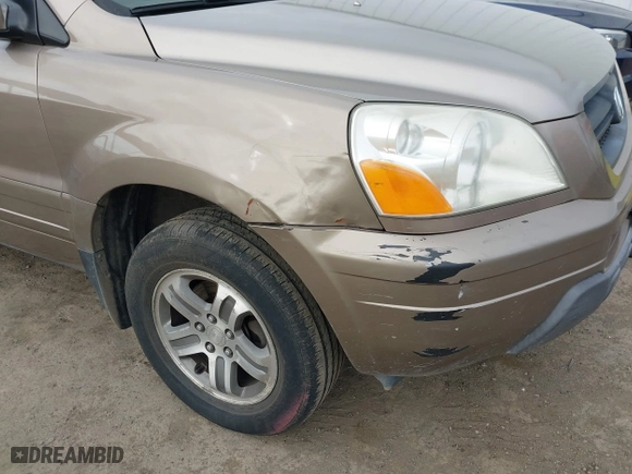 2004 Honda Pilot EX with VIN 2HKYF18594H523176, listed as a IAAI auction lot 41937743 with 310,344 mi miles. Bid and sale history available at carsss.com. Image 17.