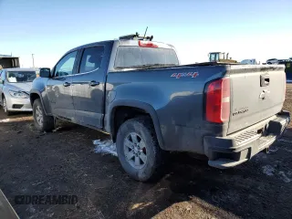 2015 Chevrolet Colorado 4WD WT with VIN 1GCGTAE32F1191129, listed as a Copart auction lot 42255765 with 106,516 mi miles and Salvage Title. Bid and sale history available at DreamBid. Image 2.