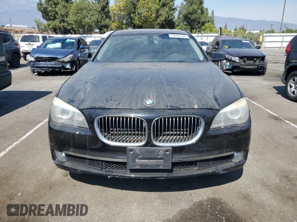 2012 BMW 7 Series 740i with VIN WBAKA4C59CDS99437, listed as a Copart auction lot 73795104 with 120,199 mi miles and Clean Title. Bid and sale history available at carsss.com. Image 5.