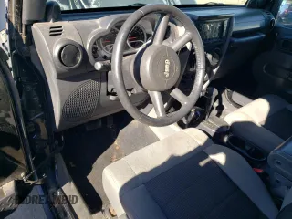 2010 Jeep Wrangler Rubicon with VIN 1J4BA6D10AL203265, listed as a Copart auction lot 79570754 with 114,840 mi miles and Salvage title. Bid and sale history available at DreamBid. Image 8.
