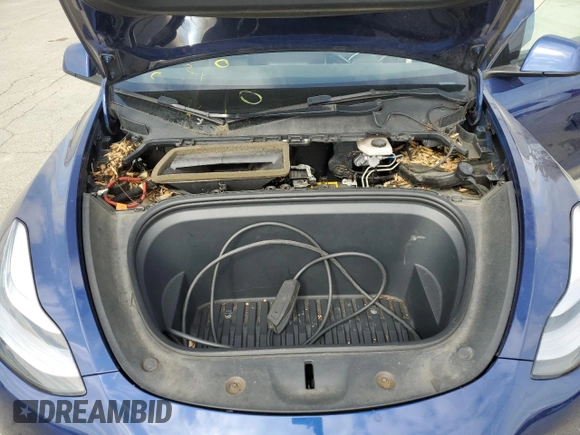 2021 Tesla Model Y Long Range with VIN 5YJYGDEEXMF192447, listed as a Copart auction lot 53550055 with 65,673 mi miles and Salvage Title. Bid and sale history available at DreamBid. Image 11.