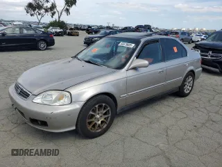 2000 Honda Civic EX with VIN 1HGEJ8644YL002969, listed as a Copart auction lot 50579605 with 301,229 mi miles and Salvage Title. Bid and sale history available at carsss.com. Image 1.
