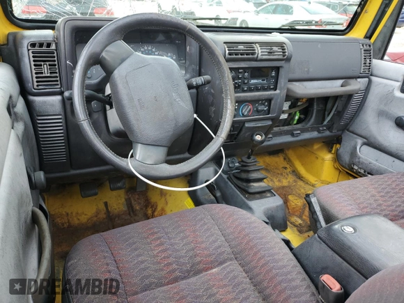 2000 Jeep Wrangler Sport with VIN 1J4FA49SXYP789791, listed as a Copart auction lot 60538875 with Not provided miles and Salvage title. Bid and sale history available at DreamBid. Image 8.