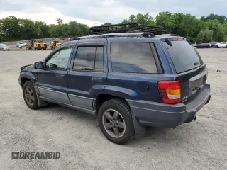 2004 Jeep Grand Cherokee Laredo with VIN 1J4GW48S64C160831, listed as a Copart auction lot 61920005 with 135,243 mi miles and Clean title. Bid and sale history available at DreamBid. Image 2.