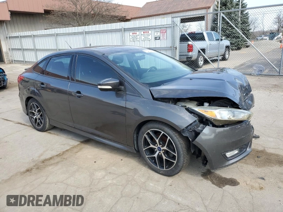 2015 Ford Focus SE z VIN 1FADP3F29FL340350, wystawiony jako Copart lot #53466455 z przebiegiem 146 374 mil mil oraz Szkoda całkowita • Salvage title. Historia ofert i sprzedaży dostępna na DreamBid. Obrazek 4.