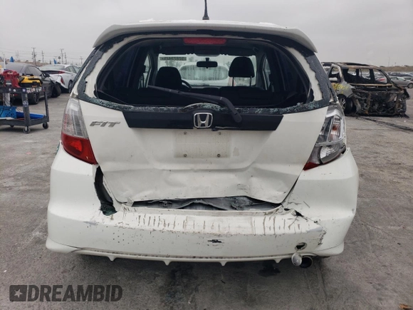 2009 Honda Fit Sport with VIN JHMGE88409S066991, listed as a Copart auction lot 52823425 with 275,722 mi miles and Salvage Title. Bid and sale history available at carsss.com. Image 6.
