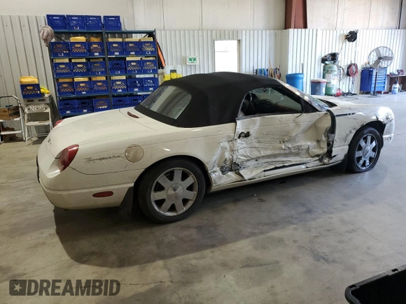 2002 Ford Thunderbird Hardtop Premium with VIN 1FAHP60A32Y125580, listed as a Copart auction lot 77493514 with 74,619 mi miles and Salvage Title. Bid and sale history available at DreamBid. Image 3.