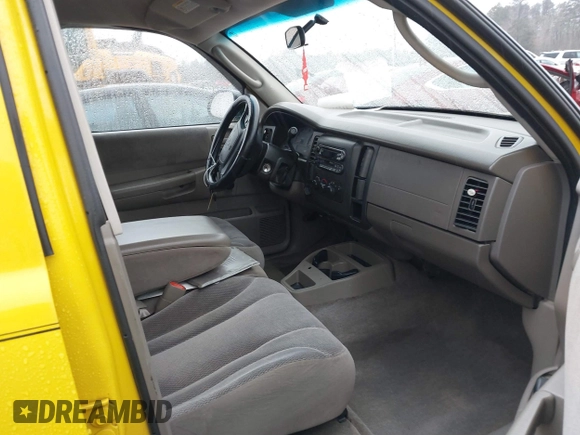 2004 Dodge Dakota Sport z VIN 1D7HG38N64S752270, wystawiony jako IAAI lot #41555599 z przebiegiem 121 283 mil mil oraz . Historia ofert i sprzedaży dostępna na DreamBid. Obrazek 5.
