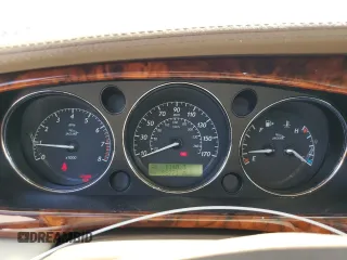 2005 Jaguar XJ Vanden Plas z VIN SAJWA82CX5SG35644, wystawiony jako Copart lot #49029245 z przebiegiem 88 771 mil mil oraz Szkoda całkowita • Salvage title. Historia ofert i sprzedaży dostępna na DreamBid. Obrazek 9.