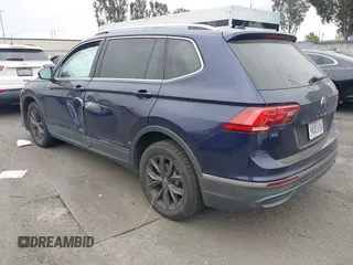 2022 Volkswagen Tiguan SE with VIN 3VV3B7AX0NM018659, listed as a IAAI auction lot 42076655 with 32,326 mi miles and . Bid and sale history available at DreamBid. Image 3.