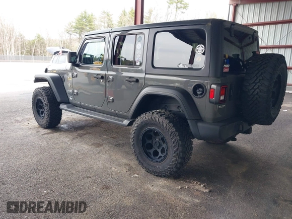2021 Jeep Wrangler Unlimited Sport S z VIN 1C4HJXDG2MW542087, wystawiony jako IAAI lot #41893734 z przebiegiem 57 000 mil mil oraz . Historia ofert i sprzedaży dostępna na DreamBid. Obrazek 3.