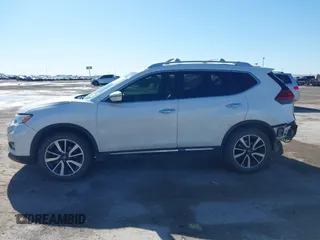 2017 Nissan Rogue S with VIN JN8AT2MV0HW250980, listed as a IAAI auction lot 41744467 with 177,319 mi miles and . Bid and sale history available at DreamBid. Image 14.